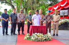 Pj Bupati Kampar Resmi Launching Polisi RW di Lapangan Pelajar Bangkinang